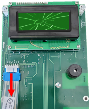 Disconnect the ribbon cable from the overlay button connector