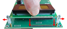 Set the LCD assembly on the PRCB-472 and align holes
