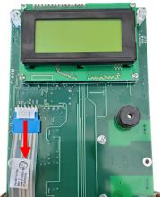 Disconnect the ribbon cable from the overlay button connector