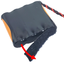 Pull off Velcro strip attached to the old battery pack
