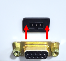 The new charging port is pushed into the charging port hole.