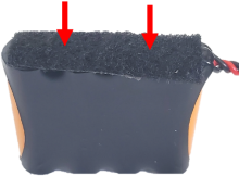 Apply the Velcro strip to the wiring side of the battery pack