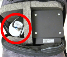Gamma detector of AT6101C on left side of backpack compartment
