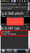 Isotope identification results are displayed at the bottom of the screen