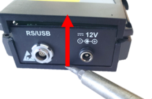 Pry tool used to slide end case cover with charger connection away from lower case
