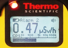 Screen of RadEye displays alarm and red LED