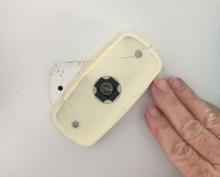 Remove fault light back plate by rotating it 45 degrees counterclockwise and gently pulling away from door
